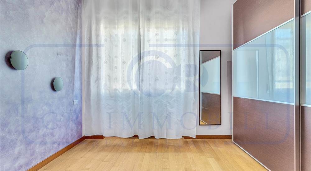 APPARTAMENTO IN VILLA BIFAMILIARE CON GIARDINO