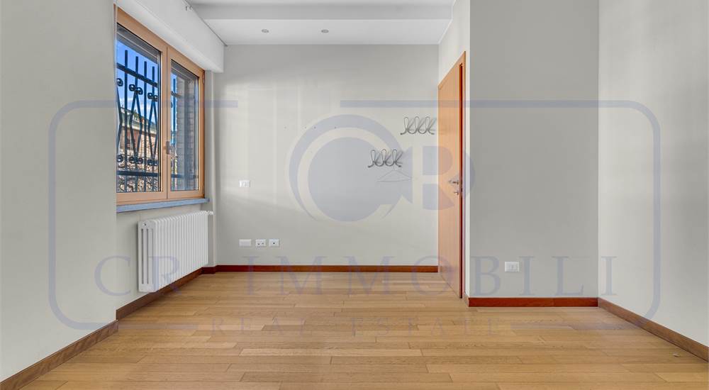 APPARTAMENTO IN VILLA BIFAMILIARE CON GIARDINO