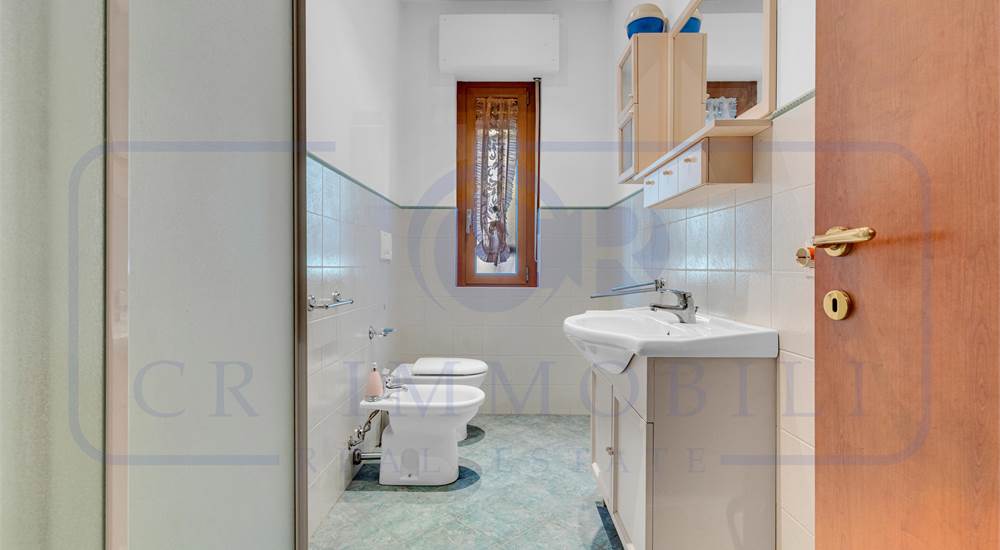 APPARTAMENTO IN VILLA BIFAMILIARE CON GIARDINO