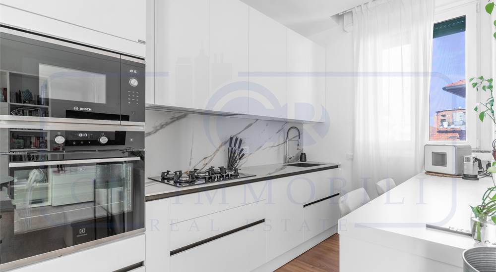 SOGGIORNO CON CUCINA A VISTA