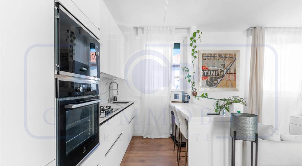 SOGGIORNO CON CUCINA A VISTA
